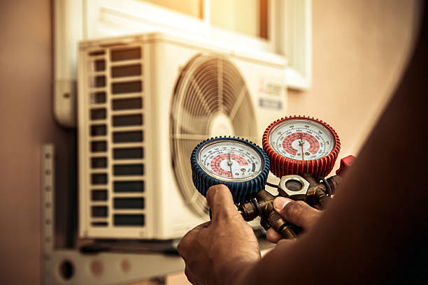 Professional Ac Installation technician working in Ashville, AL